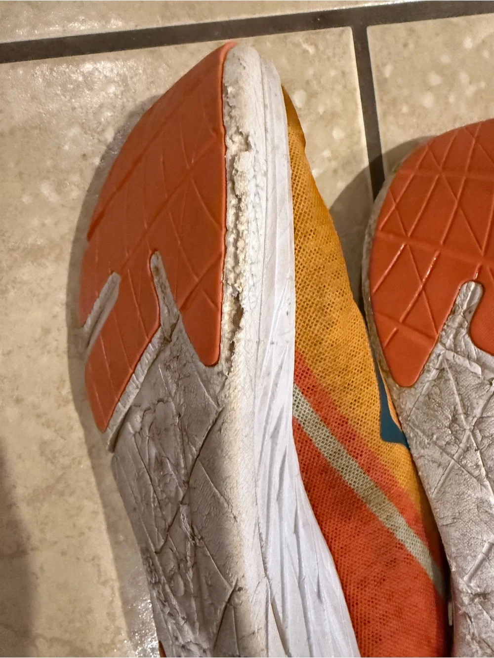 Hoka one ladies size 9.5 shoes Yellow-Orange Athletic Sneakers with Blue Accents